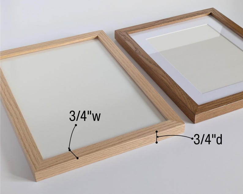 May include: Two rectangular wooden picture frames with a light wood grain finish. The frame on the left features a 3/4 inch width and a 3/4 inch depth as indicated by labels. The frame on the right includes a white mat board insert.
