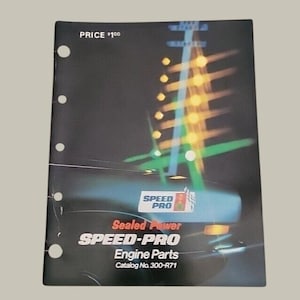 May include: A black catalog cover for Speed-Pro Engine Parts, Catalog No. 300-R71. The cover features a graphic of a car hood with light streaks, the Speed-Pro logo, and the text Sealed Power SPEED-PRO Engine Parts with a price of $1.00.