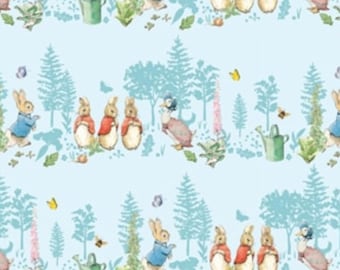 May include: A repeating pattern featuring illustrations of rabbits in blue jackets and red coats, ducks, butterflies, watering cans, and flowers on a light blue background. The design has a whimsical, storybook aesthetic, with a forest-like border.