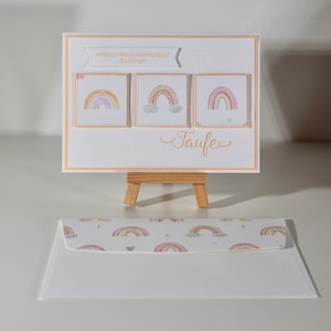 Karte zur Taufe eines Mädchens mit Regenbögen, Farben: hellorange/rosa/weiß, Text "Herzlichen Glückwunsch zu deiner Taufe"