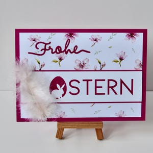 Osterkarte "Frohe Ostern" in pink mit Feder, großes B6-Format