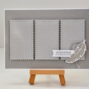 Carte de condoléances avec plume « Sincères condoléances », gris granit et blanc
