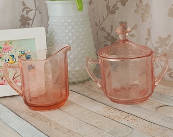 Jeannette Glass Floral pattern pink depression glass covered sugar bowl and creamer set aka Poinsetta pattern 1930s
