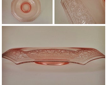 Octagonal pink depression glass console bowl with rose etch pattern at rim
