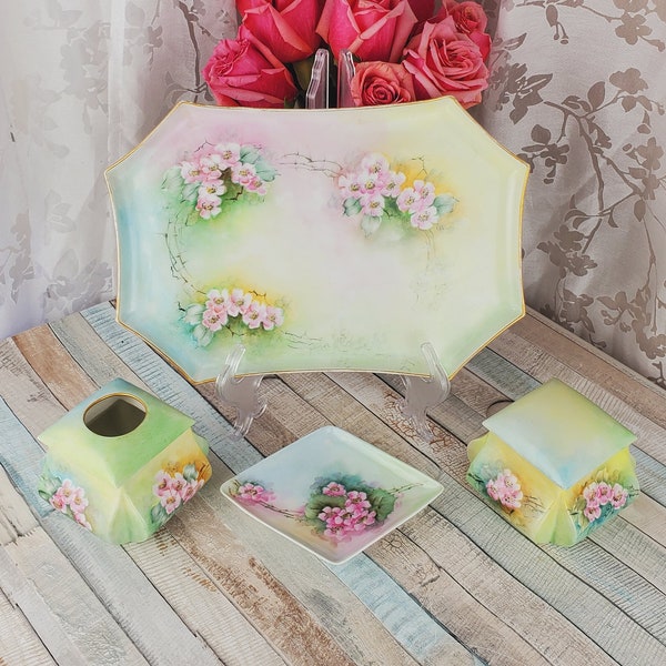 Stunning Limoges porcelain dresser set with cherry blossom pattern, large tray, hair receiver, powder box, and trinket tray