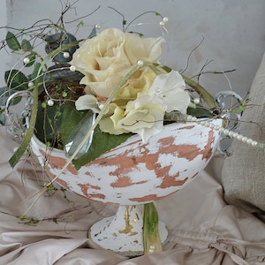 Elegant arrangement in an antique bowl