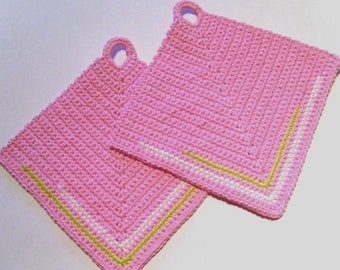 pink pot holders with green and white stripes