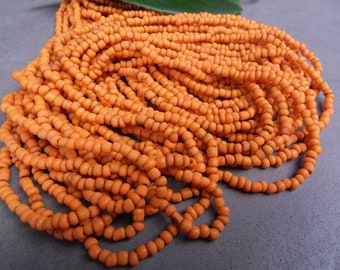 1 Strang  Rocailles von Java orange ca. 120cm über 380 Stck. sead beads