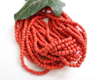 ca.110 kleine Glasperlen  59cm Strang helles rot  matt  seed beads indonesian