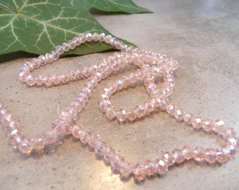 145 Kristallperlen 3x4mm light rosé Rondelle 49cm