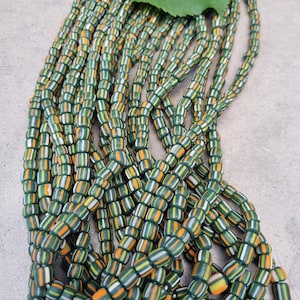 handgearbeitete Perlen von Java, Dunkelgrün Streifen Strang ca. 60cm, new indo-pacific