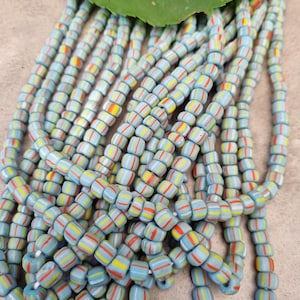ca.110 kleine Glasperlen  59cm Strang HELLBLAU matt Streifen, new indo-pacific, Java Beads, Rocailles