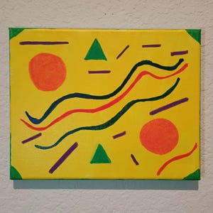 May include: Abstract art piece on canvas. The artwork features a bright yellow background with orange circles, green triangles, and wavy lines in red, black, and blue. Purple lines and green corners complete the design.
