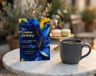 Op de afbeelding: Een rechthoekige verjaardagsuitnodigingskaart met een illustratie van een felblauwe lelie met gele verfspatten. De tekst luidt: You're invited to a Fabulous Birthday, an evening of laughter, music & radiant connection, Saturday, November 11 at 7:00 PM, The Blue Lantern House, RSVP by October 24.