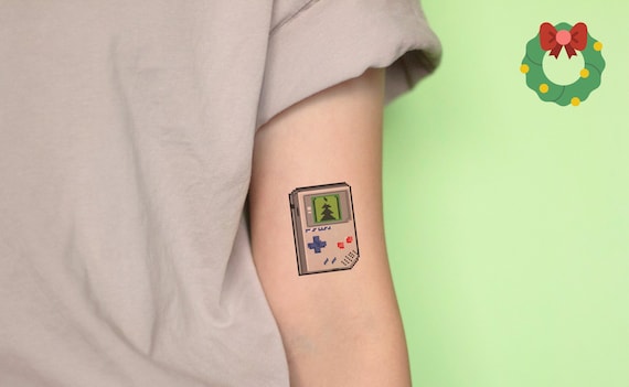 Happy Gameboy Semi-Permanent Tattoo. Lasts 1-2 weeks. Painless and easy to  apply. Organic ink. Browse more or create your own. | Inkbox™ |  Semi-Permanent Tattoos