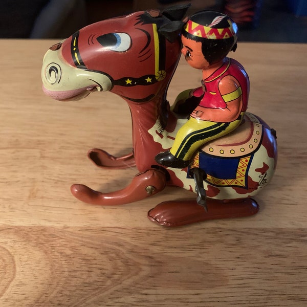 1950s mikuni made in Japan tin litho wind up toy Indian riding horse works bright colors