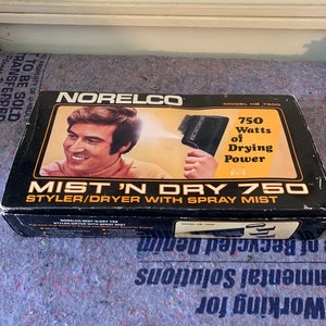 Vintage Norelco mist and dry 750 mint in box works
