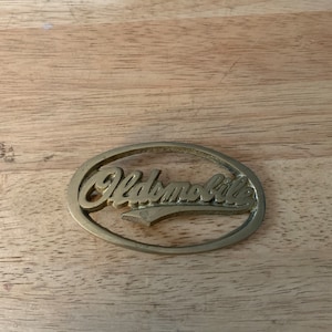Vintage 1970s Oldsmobile belt buckle made out of solid brass