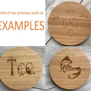 May include: Four round wooden coasters with different designs. The first coaster has the text "We love Dad" with a heart drawn below. The second coaster has the text "T.C." with two figures of children. The third coaster has a fox design with the text "Kitsune". The fourth coaster has a simple design with the text "Kitsune".