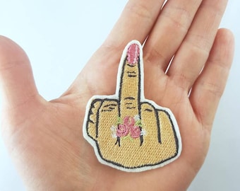 Middle finger patch iron-on application