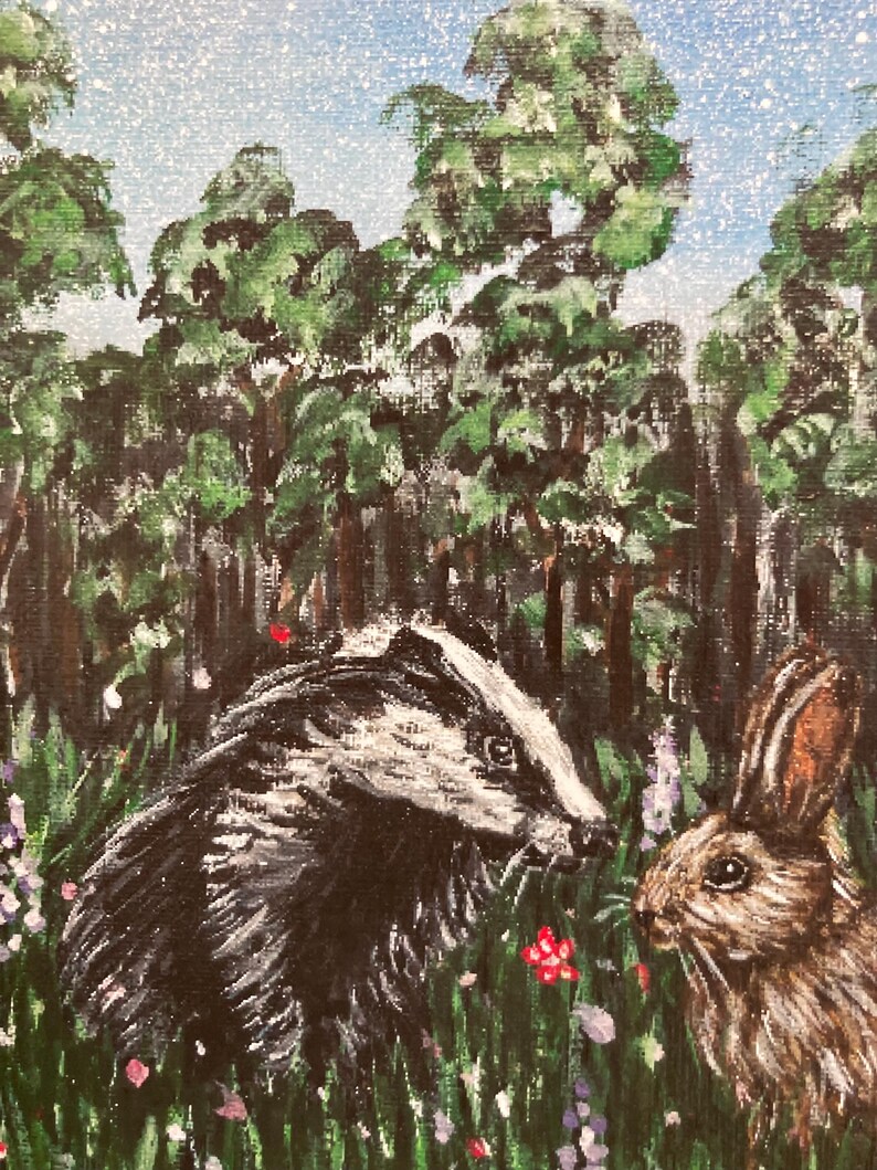 May include: An acrylic painting on canvas depicting a black and white badger and a brown rabbit standing in a field of green grass and small colorful flowers. In the background, there is a dense forest of green trees under a light blue sky.