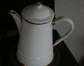 Old enamel coffee can with lid
