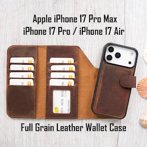 May include: A brown full-grain leather wallet case for Apple iPhone 17 Pro Max, 17 Pro, and 17 Air models. The case features card slots and a magnetic closure. The image also shows seashells.