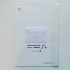 May include: A white envelope with a white card inside. The card has the text "Adventskalender "Oper" - Advent calendar "Opera"  L&ouml;sung im Umschlag solution in the envelope" and the website address "www.yellow-popen.de" and the text "designed by Iva Ludwig".
