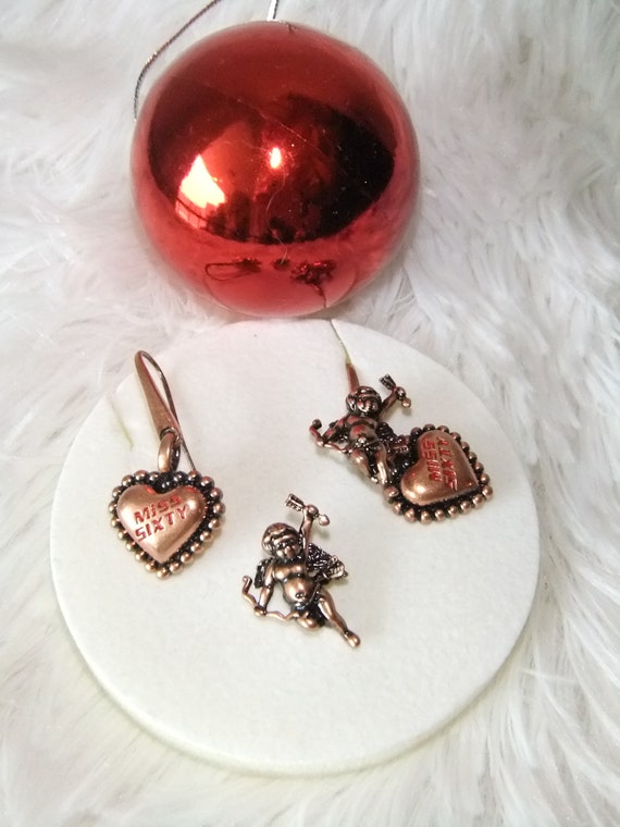 Beautiful earrings angels Miss Sixty