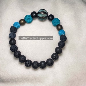 Monster Mash - brass blue and black lava bracelet