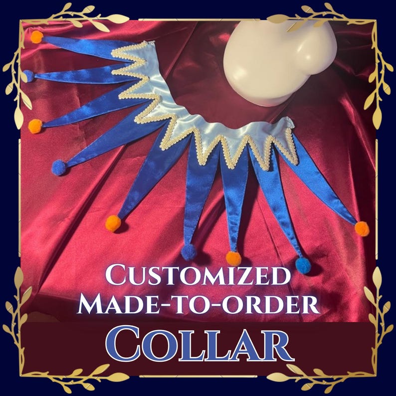 May include: A jester-style collar featuring alternating light blue and royal blue satin points, trimmed with white rickrack edging. Each point terminates in a small orange or blue pom-pom. The text CUSTOMIZED MADE-TO-ORDER COLLAR is visible.