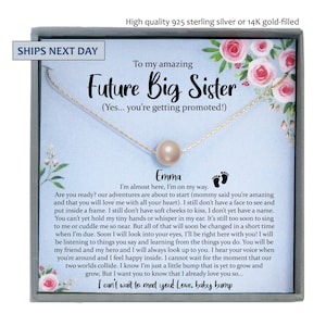 May include: A delicate necklace with a single round pearl pendant on a thin chain, presented in a gift box. The card features floral accents and text reading: To my amazing Future Big Sister (Yes... you’re getting promoted!) Emma, I’m almost here.