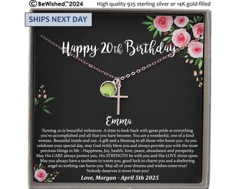 May include: A necklace with a cross pendant and a round green gemstone charm, presented in a gift box. The card inside features the text Happy 20th Birthday, the name Emma, and a message, decorated with pink floral illustrations on a black background.