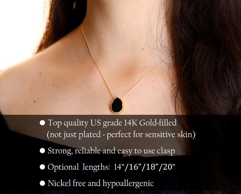 May include: A delicate gold-filled necklace with a black teardrop pendant. The necklace is available in lengths of 14, 16, 18, and 20 inches. It is nickel-free and hypoallergenic.