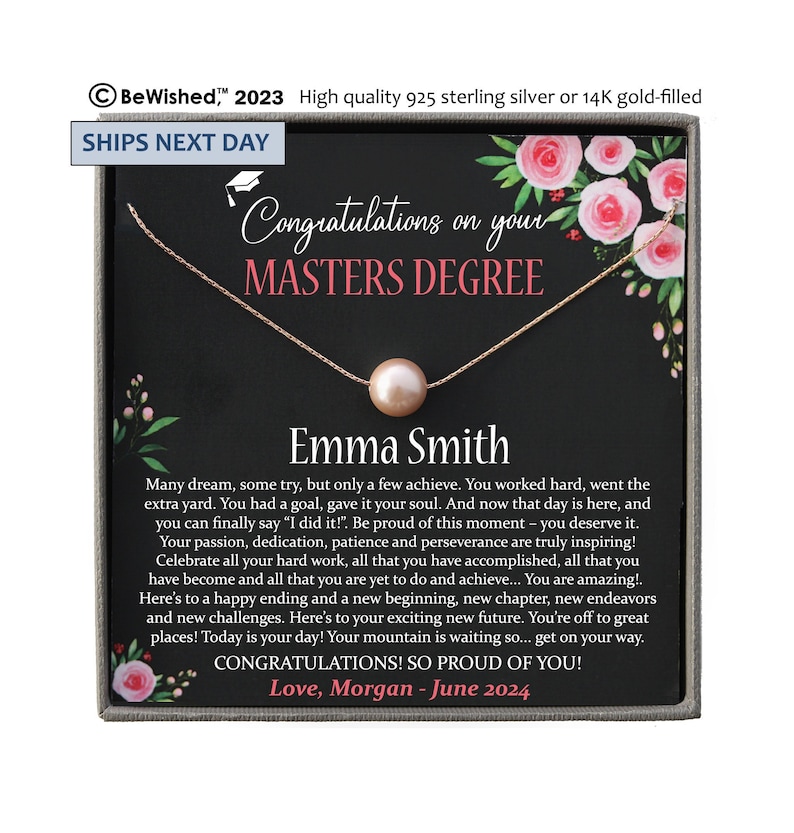 May include: A rose gold necklace with a single pearl pendant, presented in a gift box. The box features floral accents and text that reads "Congratulations on your Masters Degree" and a personalized message. The text also includes the name "Emma Smith".