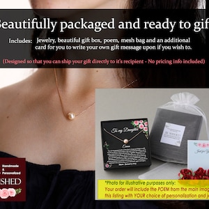 May include: A gold chain necklace with a single round pearl pendant. The set includes a black gift box with a printed poem and floral accents, a white mesh drawstring bag, and a small white card with the text Just for You and floral art.