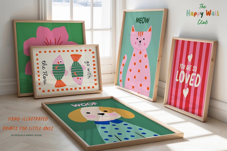 May include: A set of framed art prints with playful illustrations. The prints depict a pink flower, two fish, a pink cat with spots, a dog, and the text "You Are So Loved". The frames are made of light wood.