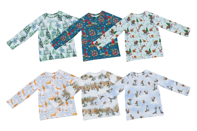 以下が含まれることがあります： 冬をテーマにした異なるパターンが施された長袖シャツ6枚。シャツには、青、緑、赤、白の色合いで、木、リース、鳥、動物のデザインが施されています。