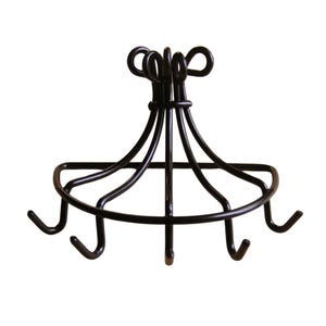 May include: Black metal pot rack with a decorative top and six hooks.