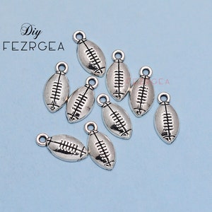 50PCS Antique silver football charms. Sports pendants. CY175