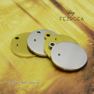May include: Four round metal tags with different finishes. The tags are labeled A, B, C, and D. The text "DIY FEZRGEA" is at the top of the image. The text "Styles for choice" is at the bottom of the image.