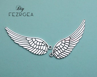 10 SZT.--50 x 11 mm, Antyczne srebrne zawieszki w kształcie skrzydeł anioła. Duże wisiorki w kształcie skrzydeł anioła.