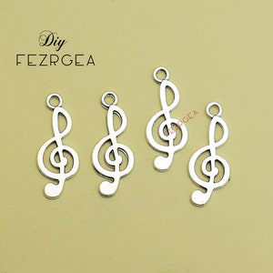 25PCS--25x10mm, Antique silver Treble Clef and Note charms. 2 sides Music pendants.