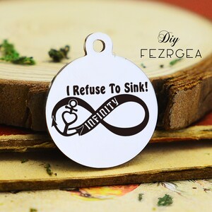 May include: Silver charm with an infinity symbol and an anchor with a heart. The charm has the text "I Refuse To Sink!" and "INFINITY" inscribed on it.
