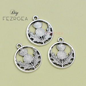 25PCS--16x19mm, Antique silver Thistle flower Charms. Silver Scottish Thistle Flower Stamping .