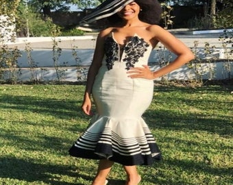 black dress with zulu traditional accessories