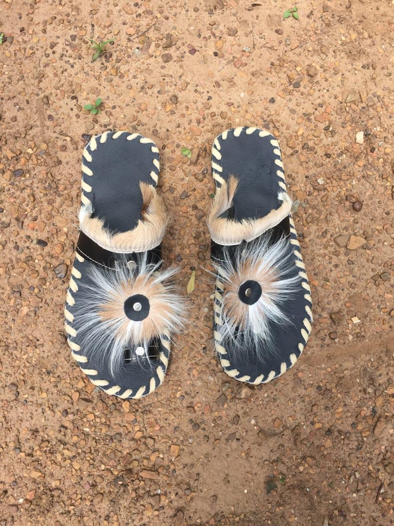 Handcrafted Zulu Imbadada sandals made from genuine springbok hide, traditional African footwear with historical significance.