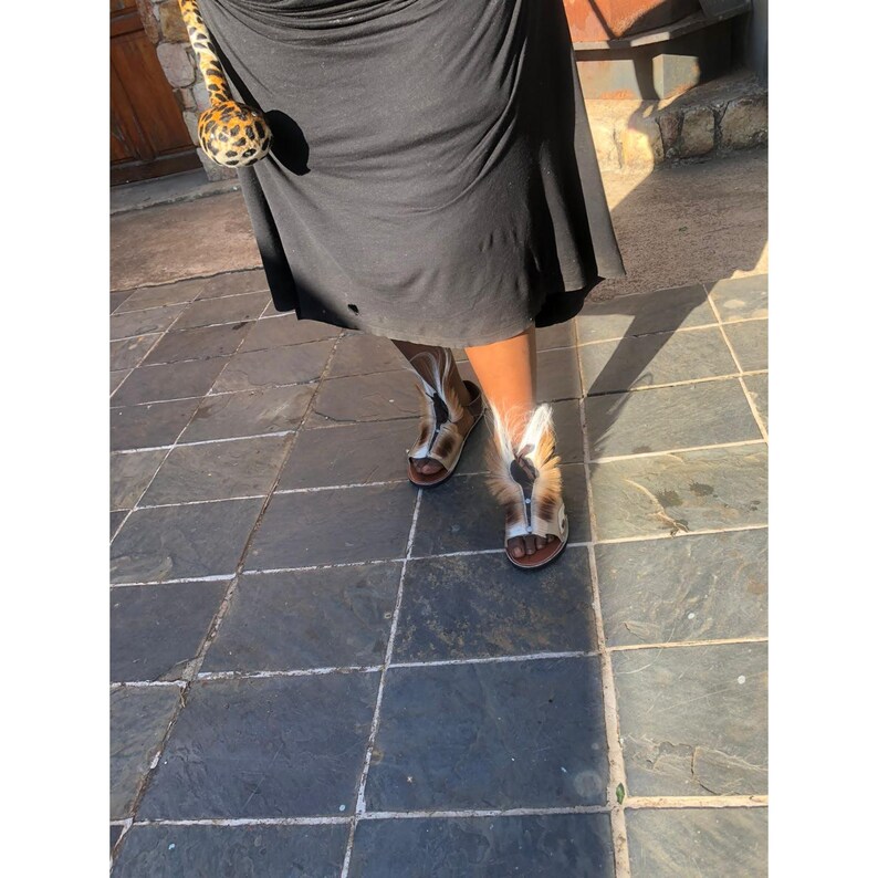 Handcrafted Zulu Imbadada sandals made from genuine springbok hide, traditional African footwear with historical significance.