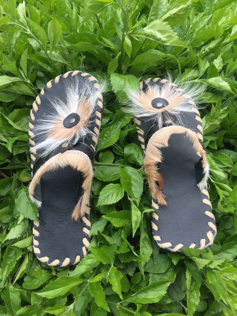 Handcrafted Zulu Imbadada sandals made from genuine springbok hide, traditional African footwear with historical significance.