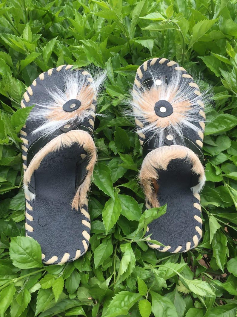 Handcrafted Zulu Imbadada sandals made from genuine springbok hide, traditional African footwear with historical significance.